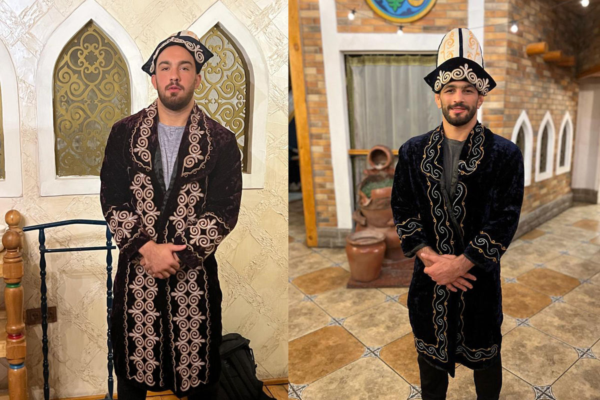 تجلیل از دو قهرمان کشتی ایران با لباس محلی در قزاقستان